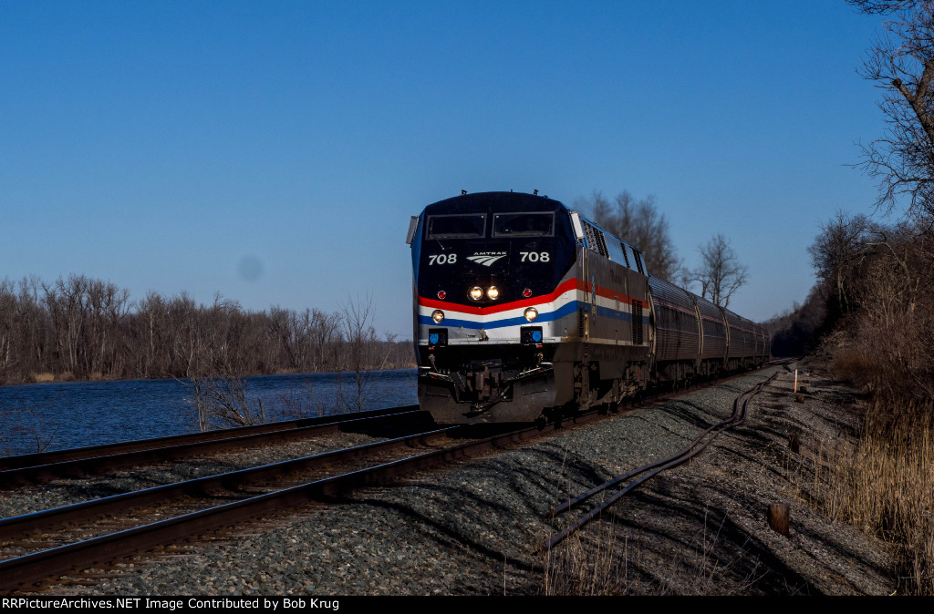 AMTK 708 leads southbound Empire Service train